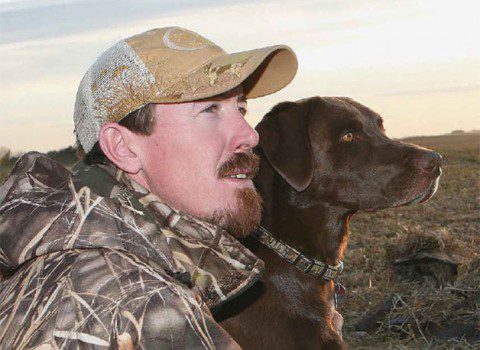 Hunter with his dog.